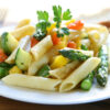 Pasta primavera with fresh veggies, olive oil, garlic lemon and feta cheese